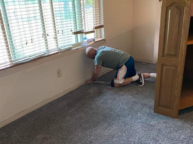 JT's Home Repair crew installing new carpet and flooring in Central Arkansas