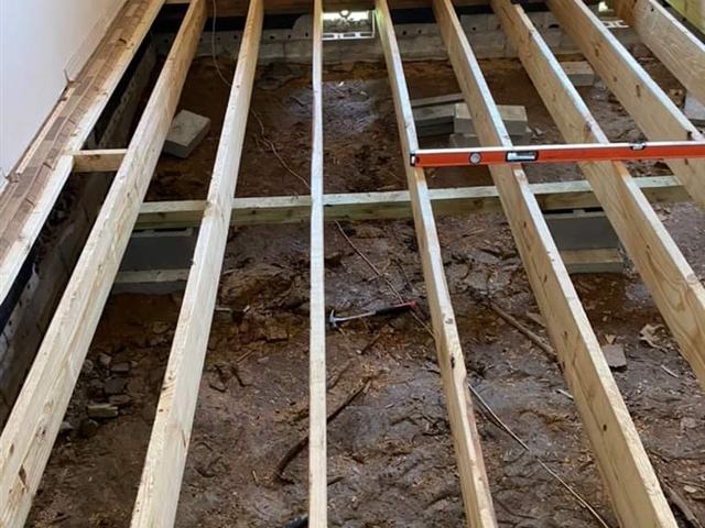 Floor joist replacement during a structural home repair in Central Arkansas