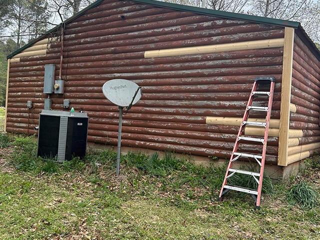Log home structural restoration and interior update in Central Arkansas
