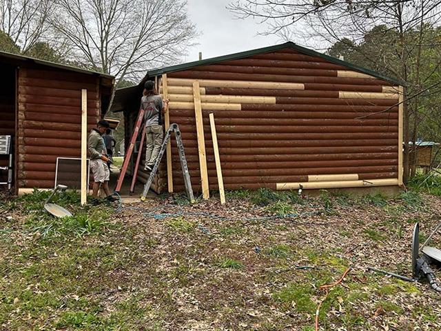 Log home chinking and exterior restoration in Central Arkansas