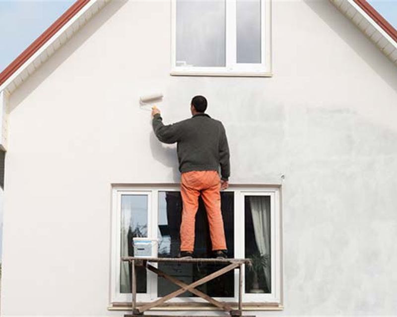 Exterior siding and trim painting on a Central Arkansas home