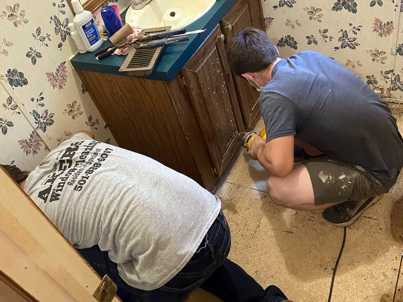 JT's crew working on a bathroom renovation in Central Arkansas
