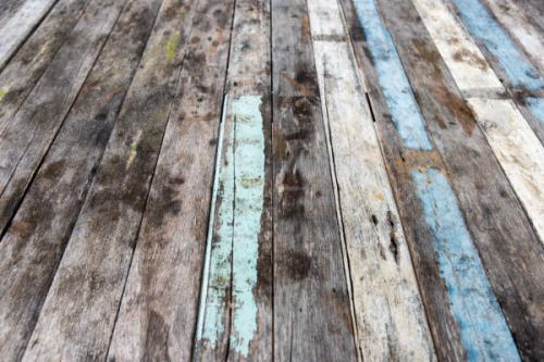 Soft or damaged subfloor being inspected by a home repair professional