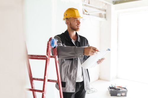 contractor planning a home remodeling project for homeowner